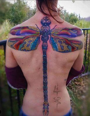 Full back dragonfly tattoo.