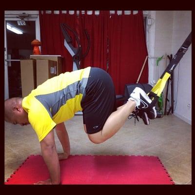 TRX crunch, one-on-one training.