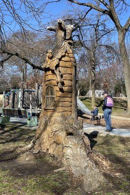 Dead oak tree transformed into woodland creature sculpture.