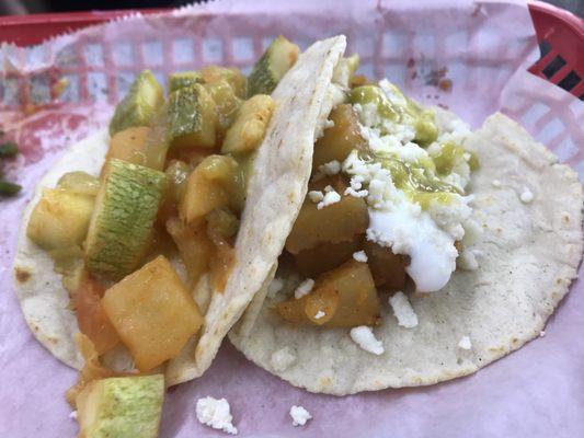 These tacos are squash and chorizo and potatoes Tacos.