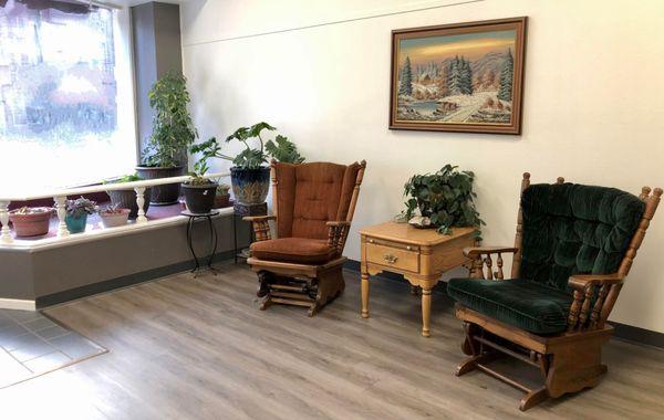 Pipestone Massage and Wellness Ruston Aaker LMT Sunny, plant filled waiting area