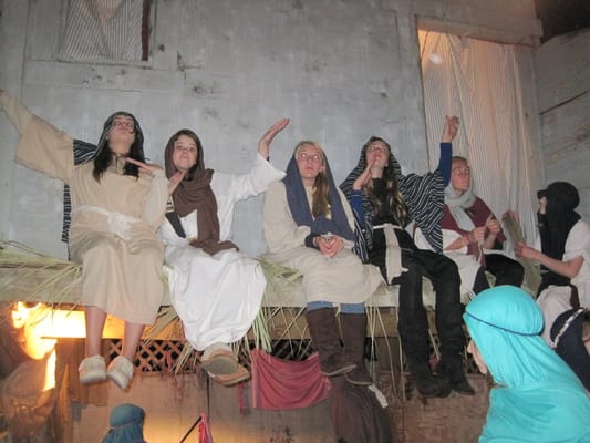 These kids were sit-dancing on the roof to some music.