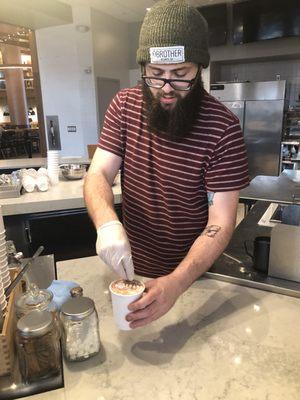 Bastian creating with peppermint bark!