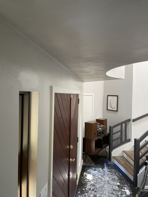 Front entrance with veneer plastering