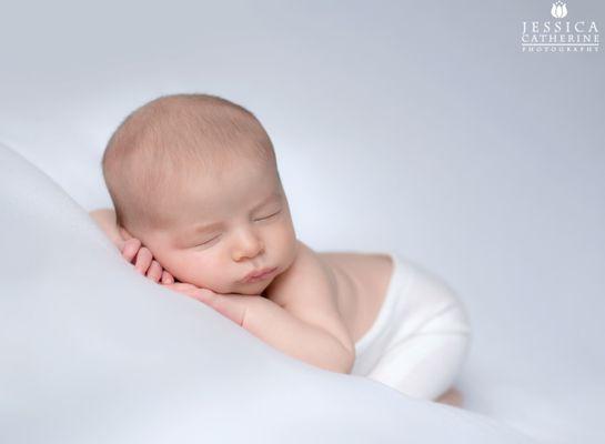 Baby-boy-on-white-background