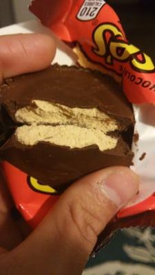 Dried out expired Reese's PB Cup... not tasty even when sick and can't taste anything