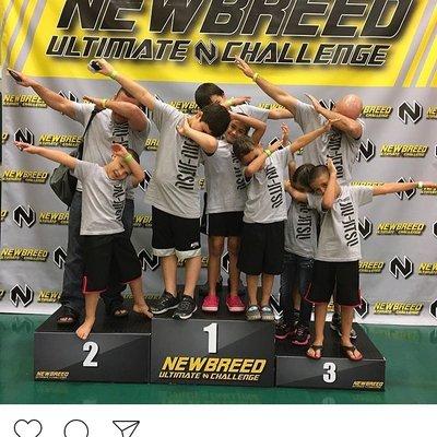 Our kids dabbing on the Newbreed podium!