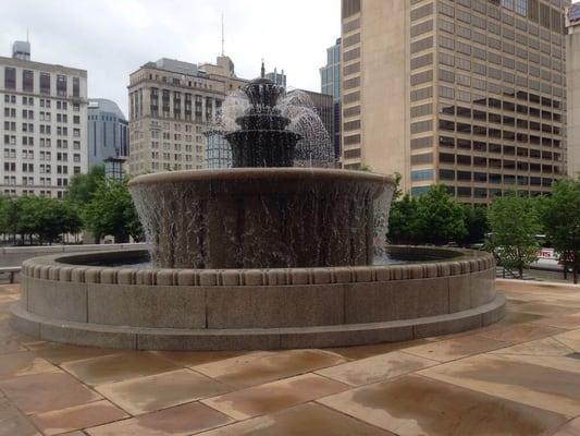 The beautiful fountain in front of the building.