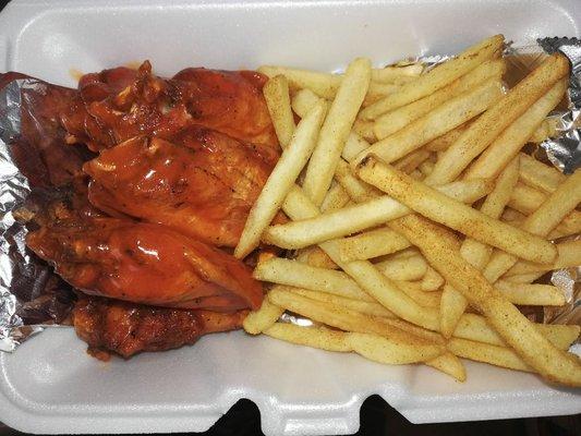 Buffalo wings and French fries