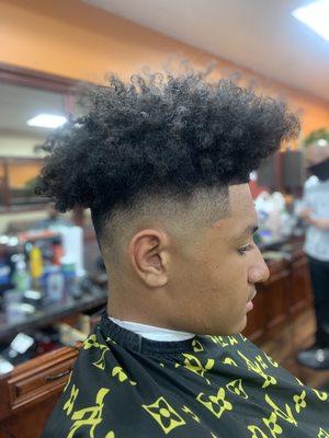 Mid fade curls on top