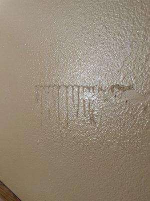 Mystery stain above the bed