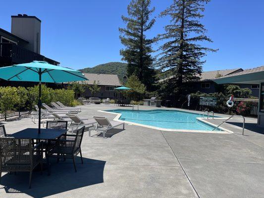 Pool, fire pit, and grill area