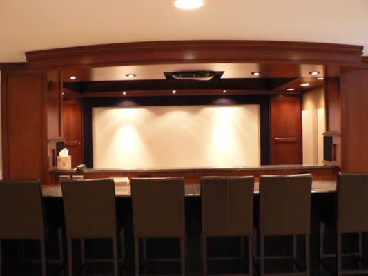 Custom cherry home theater with 14' screen by HS.