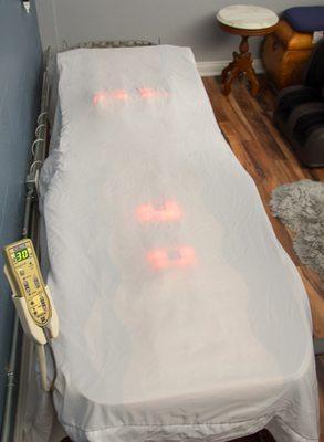 Jade Thermal Massage Bed -  FDA approved class II medical device. It combines deep far infrared heat, massage therapy and acupressure.