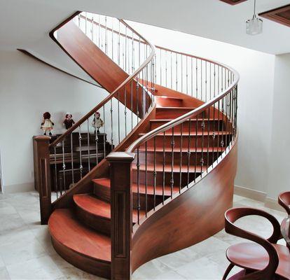 Bountiful Freestanding Staircase Mahogany Iron Balusters