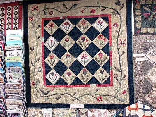 I LOOOOVE this applique quilt.