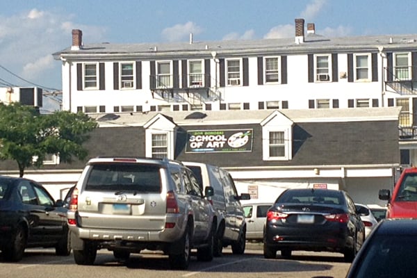 View from the Shelton post office parking lot. Entrance on side of building...top floor.