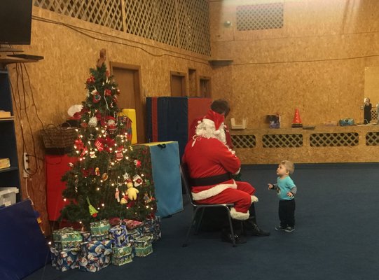 Santa takes time out of his busy schedule to stop into Child Care Plus during our Christmas party.