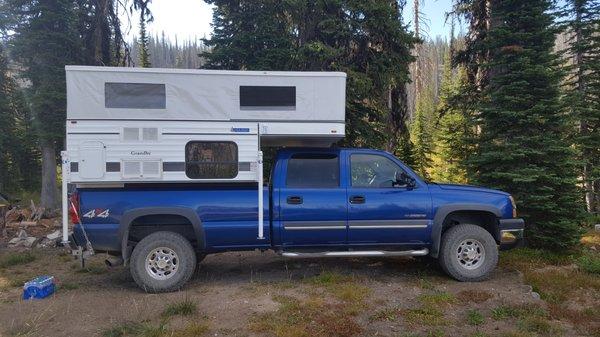 Bosses truck with a Four Wheel Camper on it!