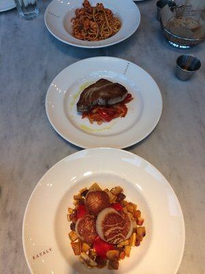 Entrees (from top): Spahgetti pomodoro with shrimp; seared tuna steak; seared scallops