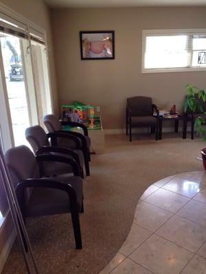 Comfortable waiting room with toys for kids to play with