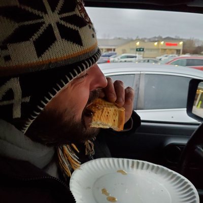 Hubby chowing down on his slice.