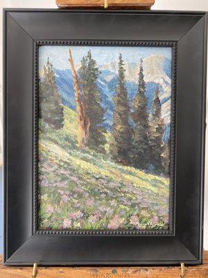 "High Mountain Meadow" in a simple black frame.