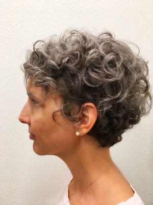 Beautiful short curly cut. Some cream and gel to hold the curl. Easy!