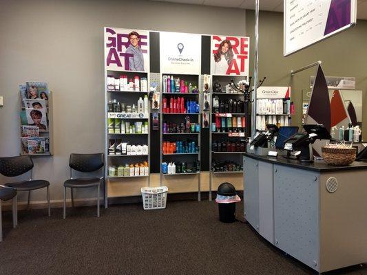 products and cashier and bowl of lollies