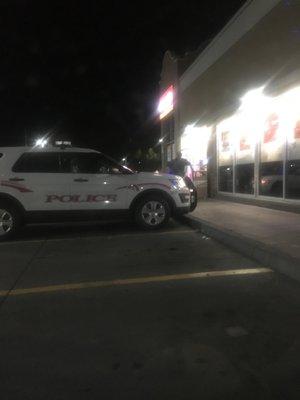 Employees and UNM police just chilling outside.