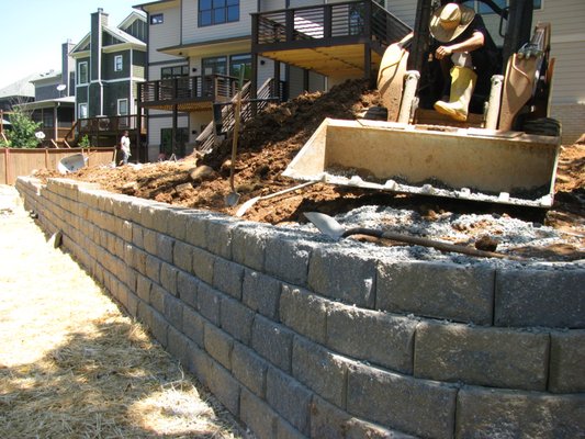 Retaining Wall and grading  Call us to If you want your home to have major key upgrades!