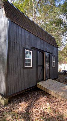 Old storage paint with dark gray and black trim.