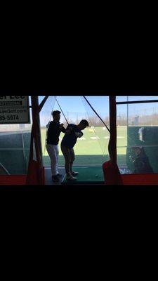 Gabe Lee helping me with my backswing.