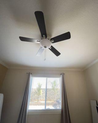 Ceiling fan and window blinds.