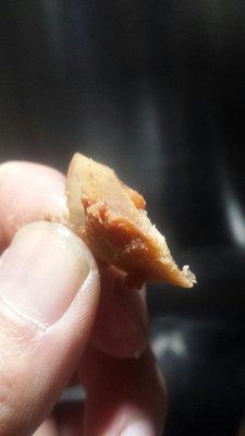 This bone was found in the pizza when I ate it.