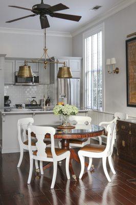 Loft at Greatmen Cottage Vacation Rental Home. Lovely mahogany antique pedestal dining table from the 1800's. Vacation Rentals New Orleans.