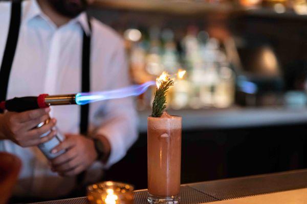 Enjoy handcrafted cocktails in a warm setting.