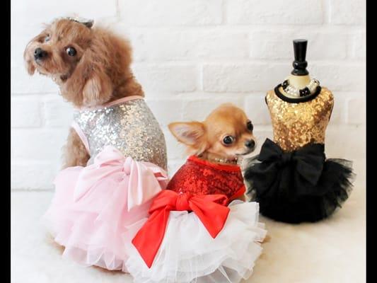 Fancy dog clothes ( dresses , tutus , sweaters ) and a whole lot more ....