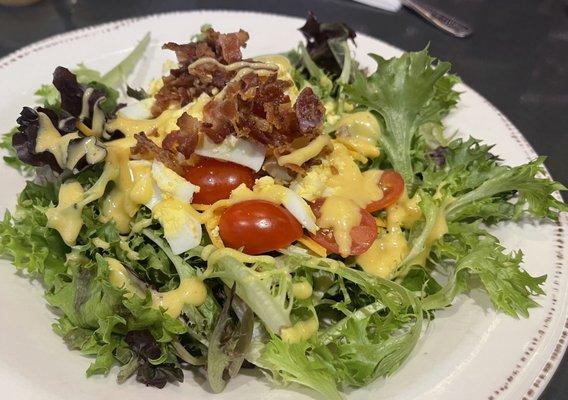 House salad w/ honey mustard dressing.