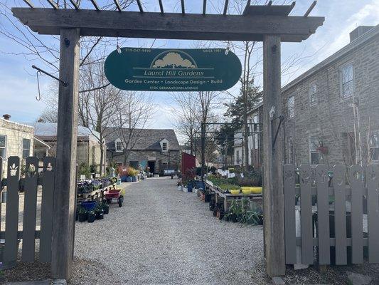 Our front gate welcomes you into the garden shop where many treasures can be found.