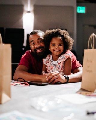 Tables in the back of the worship center are perfect for parents who want to bring their children to worship!