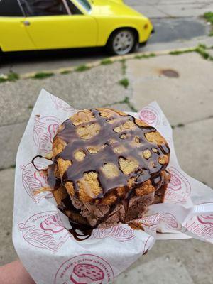 This is the cookie sandwich with chocolate chip cookies and chocolate ice cream and a chocolate and caramel drizzle.