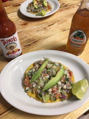 Fish ceviche tostada,  original Tapatio sauce,  and a Jarrito.   Oh so darn good.