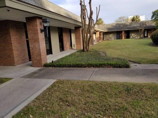 Walkway to front door in back of the building