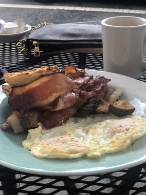 two eggs bacon home fries and english muffin