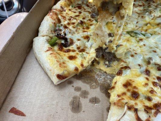 The manager tried to tell me that this isn't a soggy nasty pizza and refused to remake it