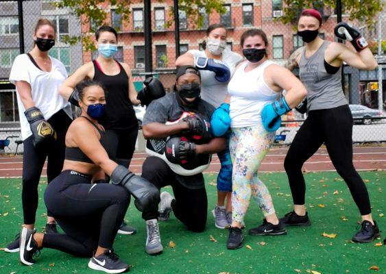 Small Outdoor kickboxing class.