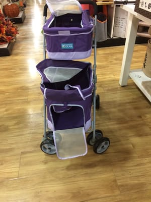 Double-decker dog stroller.