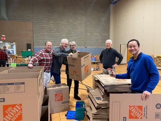 Filling totes for Shepherd Community Center