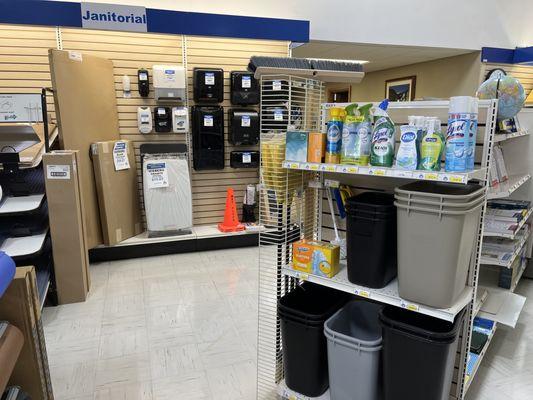 A selection of janitorial and sanitation dispensers and supplies.